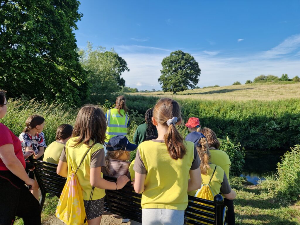 A photo of 6th Yeovil Brownies Group talking about YRCT projects such as the River Yeo and local wildlife.